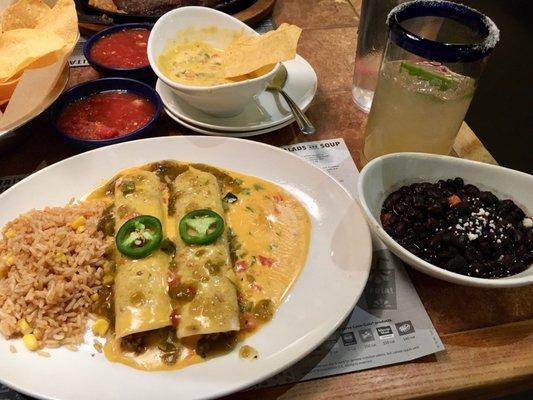 Border Queso Beef Enchiladas - subbed black beans on the side, queso dip appetizer and Borderita marg in background