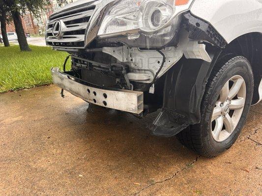 Front bumper pulled off after driving through flood waters in Galveston