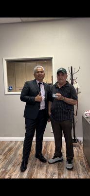 Attorney Arturo Burga and our happy client able to legally work in the Us after receiving his work permit.