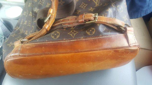 My baby and gift from my mother. 30 year old vintage Louis Vuitton. One of the straps was repaired. Can you guess which? $18! I'm pleased!