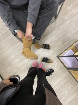 trying on winter shoes