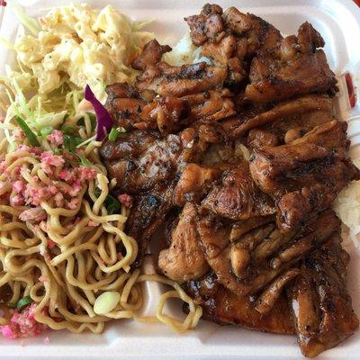 Korean BBQ chicken w/ two scoops of rice, fried noodles (pink bits are chopped fish cake), and macaroni salad over shredded cabbage.