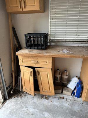 Junk left in garage and cabinets broken upon arrival