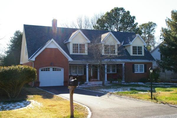 Single family residence in St. Michaels, Maryland. Convert existing ranch style house to a Cape style with the addition of a ...