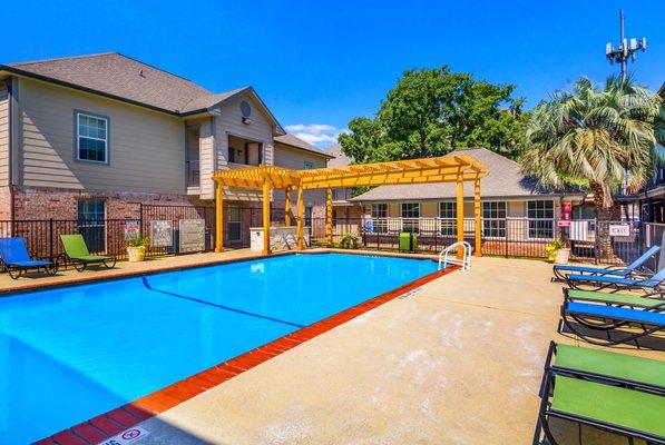 Poolside at The Heritage at Hillcrest apartments in Austin, TX