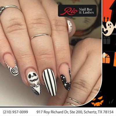 Witchy nails, anyone? Embrace the magic of Halloween with dark and mystical designs at our salon. ‍