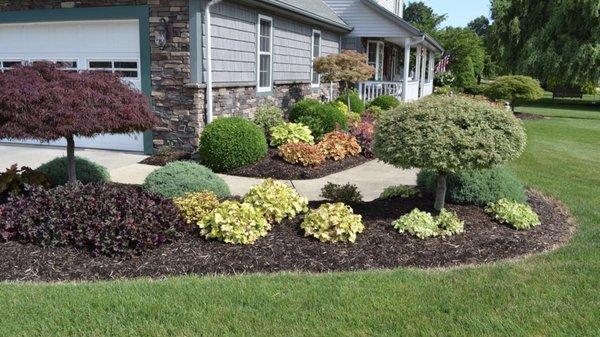 Clean up and arrange bushes and flowers.