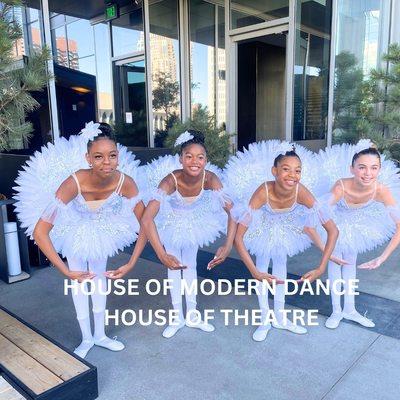 Elite dancers in white tutu's dance at the Four Seasons Hotel Downtown Minneapolis MN