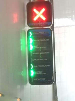 Automated list of what is being done that you can see while you are  inside the car wash