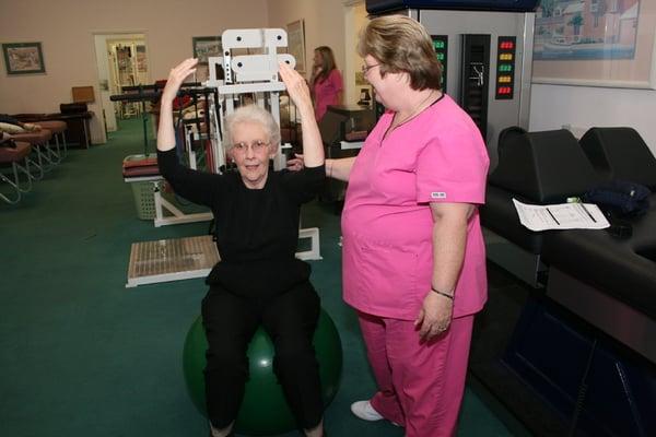 Patient Rehabbing on Exercise Ball