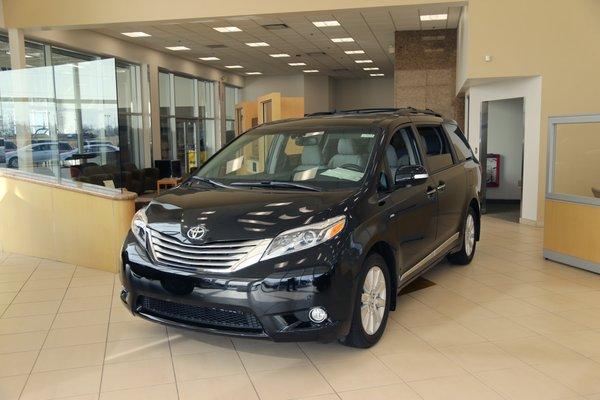 Our spacious waiting area features plenty of vehicles, like this Toyota Sienna, to look at and sit in.