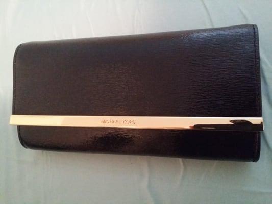 20 %  off Michael Kors clutch purse