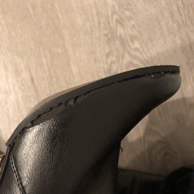 More rips on the outer part of my boots :(