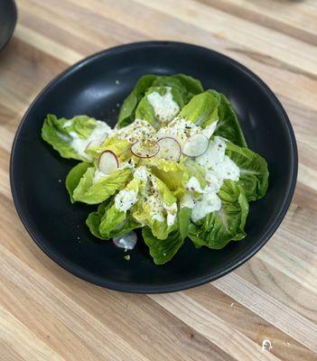 Gem lettuce with creamy pistachio dressing