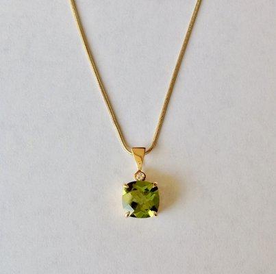 Peridot... The favorite gem of Cleopatra. 4.28 ct fusion cut with .05 cts dia