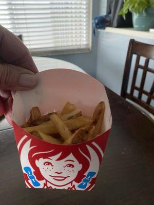 Fries and a cold burger that were just purchased