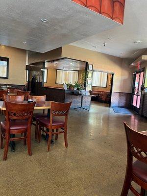 Spacious seating, and a bar and dinning area in the back for larger events.