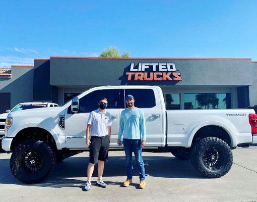 Big league pitcher Robbie Ray with his new F-350 Tremor from Lifted Trucks