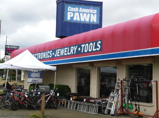 Some of the inventory outside the front door of the PAWN shop