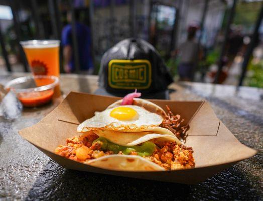 Chilaquiles taco and brisket taco with sunny egg @coreyd123 on IG