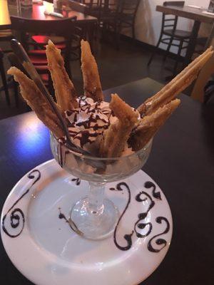 Vanilla filled churros with ice cream. Made my meal!