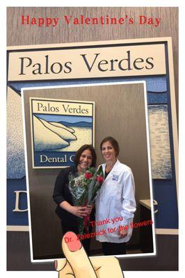 Two of our Team Members enjoying a Happy Valentine's Day with beautiful roses!