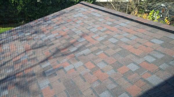 Back Sun-room roof after West Michigan Roofing completed!  Looks amazing, and they even put a vent all along the top.