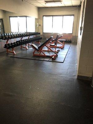 Another weight room with free weights