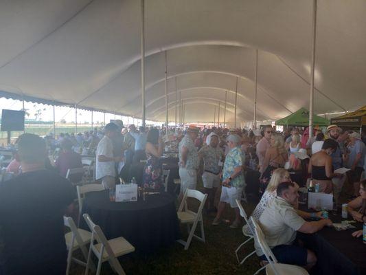 Woodford Reserve VIP tent, had DJ and bars with view of track, and betting