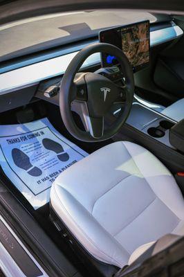 Tesla model, three driver side, interior detail, leather conditioning, carpet, shampoo, and deodorizer service