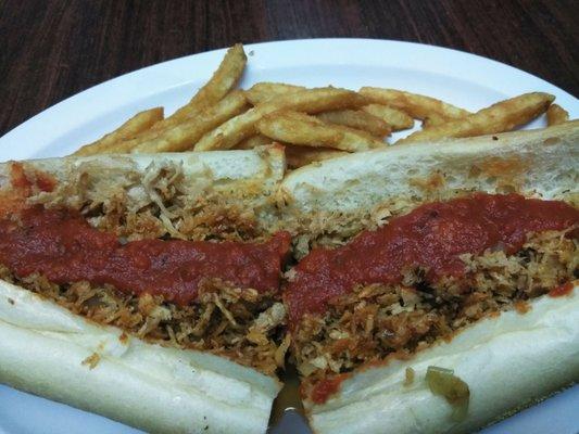 Chicken Cheese Steak with sauce and onions. One of the lunch specials.