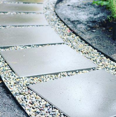 The combination of angular pavers and soft curves make this pave interesting and low maintenance.