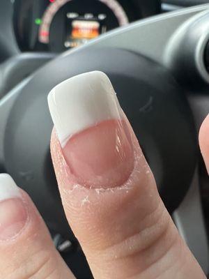 White powder over the white tip made it uneven. Absolutely no cuticle removal or lotion.