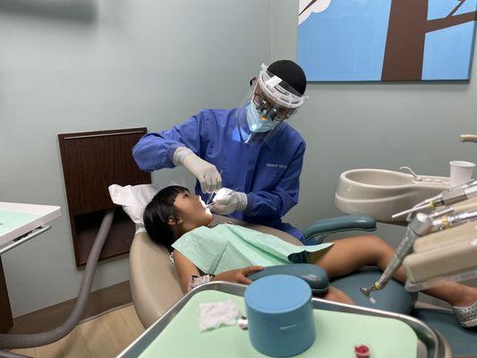 Dr. Yap checking my 4 yo's teeth