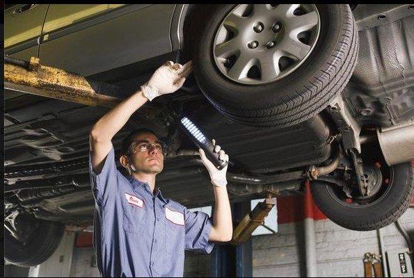 Auto Mechanic Servicing your car of Clausen Automotive, Madison, WI