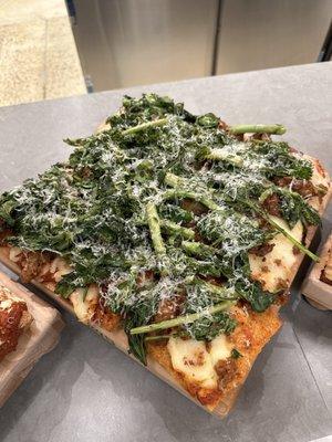 Broccoli rabe & sausage pizza (display slice, what we thought we'd get)