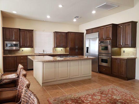 Refinished island and kitchen cabinets for a contrast look