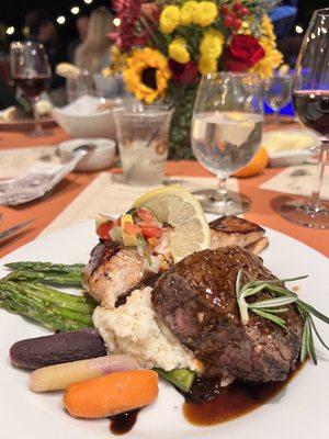 The most amazing filet with peppercorn sauce, miso glazed salmon, horseradish mashed potatoes, asparagus and baby carrots.