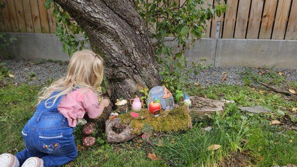 Playing in our little fairy garden area.