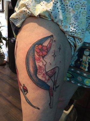 Blue Moon tatted woman. Contact Kenna Dolan, owner at Broadway ink.