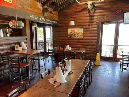 One part of the spacious interior dining area with a nice BBQ shack vibe and paper towel rolls as napkins.