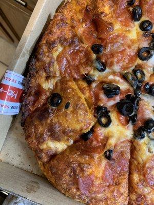 Pepperoni pizza with black olives and EXTRA cheese