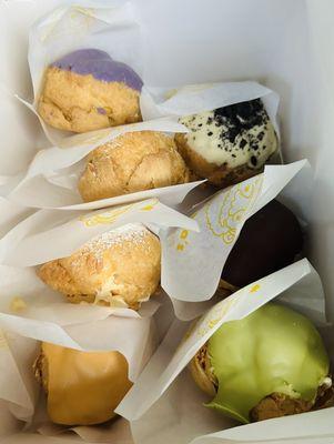 Ube, Original (vanilla fill), Original (peach + passion fruit fill), Passion Peach Puff (Flavor of the Month), Oreo, Chocolate, Green Tea!!