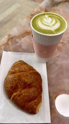 Yummy matcha latte with oat milk and sour duck croissant