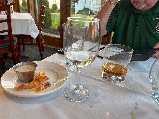 What's left of the Caesar dressing, jumbo shrimp, the fantastic Chardonnay and a glass of Western Reserve organic wheat whiskey.