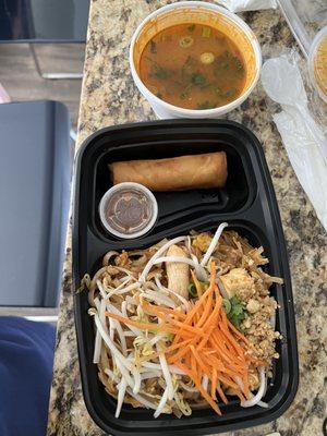 Lunch special: pad Thai with chicken, spring roll, and lemongrass chicken soup