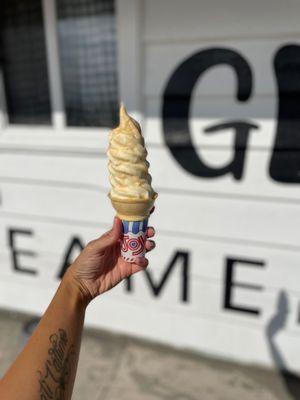 Swirl cone dipped in white chocolate glaze