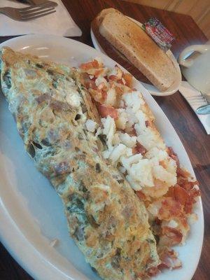 Gyro Omelette w/Spinach and Feta Cheese and American Potatoes - Rye Toast in the background