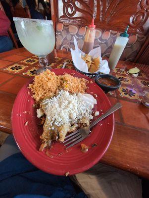 Enchiladas, green sauce with pork.