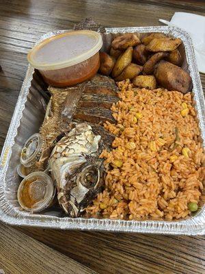 Liberian jollof rice (riz au gras) with tilapia